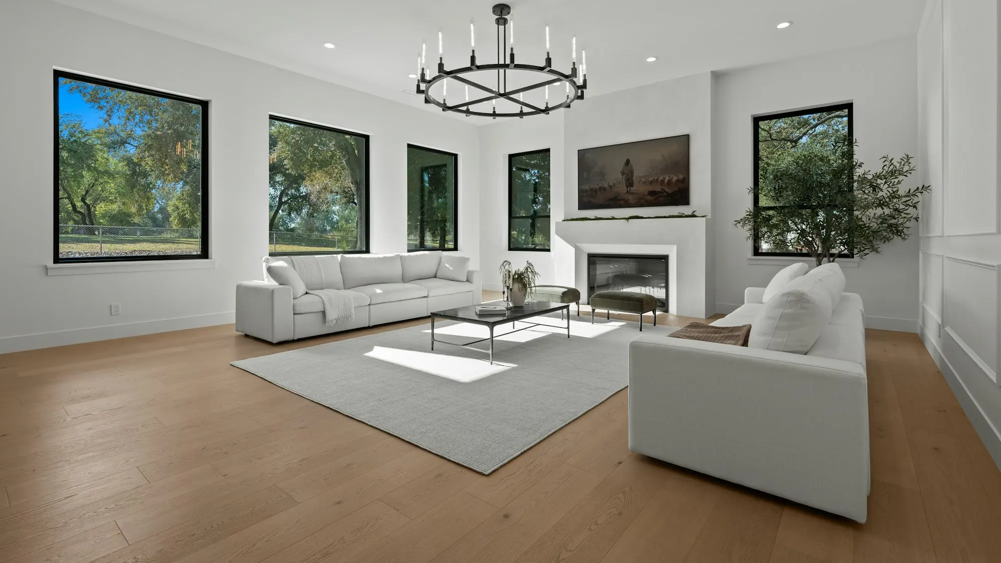 Bright living room with wide-plank light oak hardwood floors
