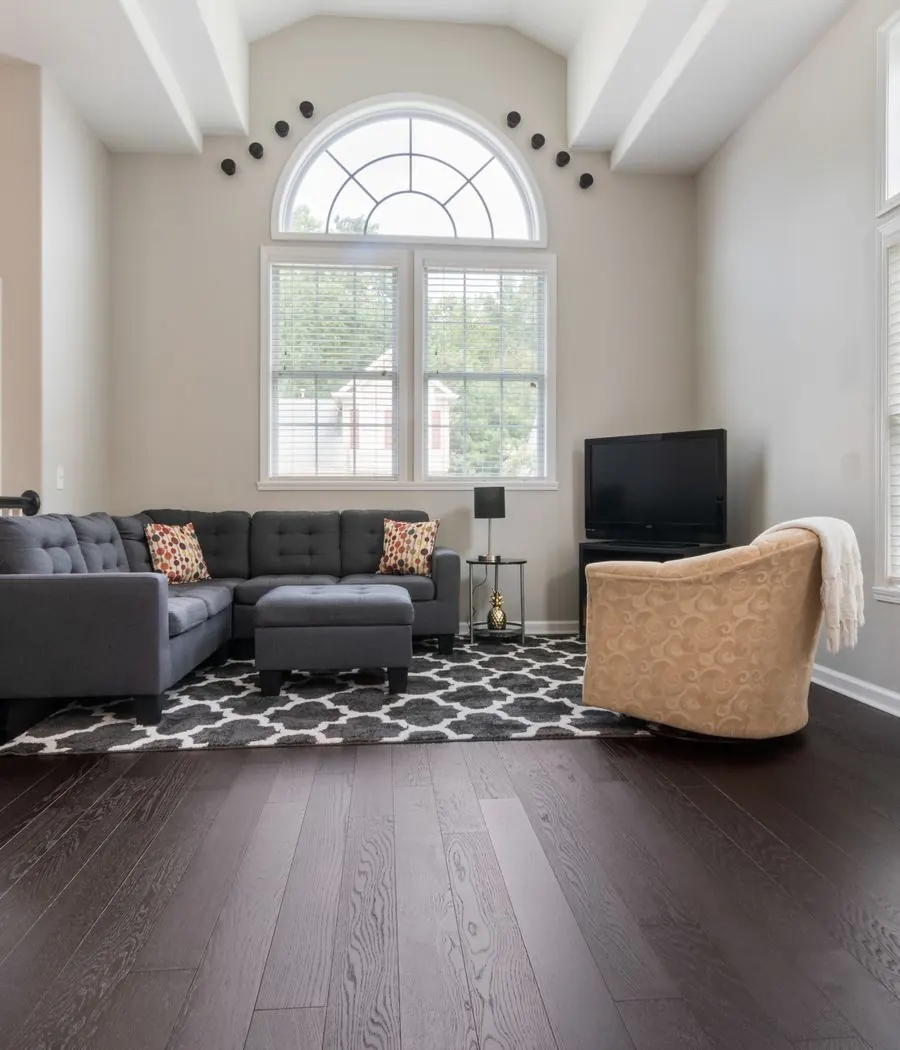 Wide-plank hardwood flooring in a Mediterra, Florida home